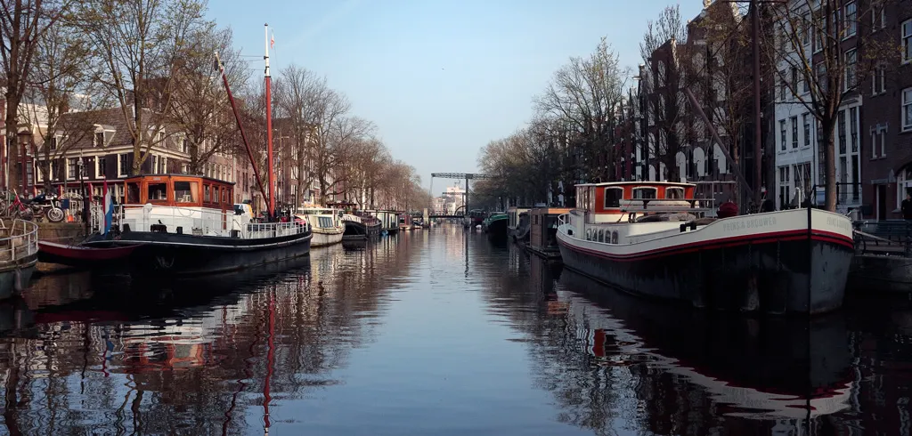 A view of one of Amsterdam's canals early in the morning A view of one of Amsterdam's canals early in the morning