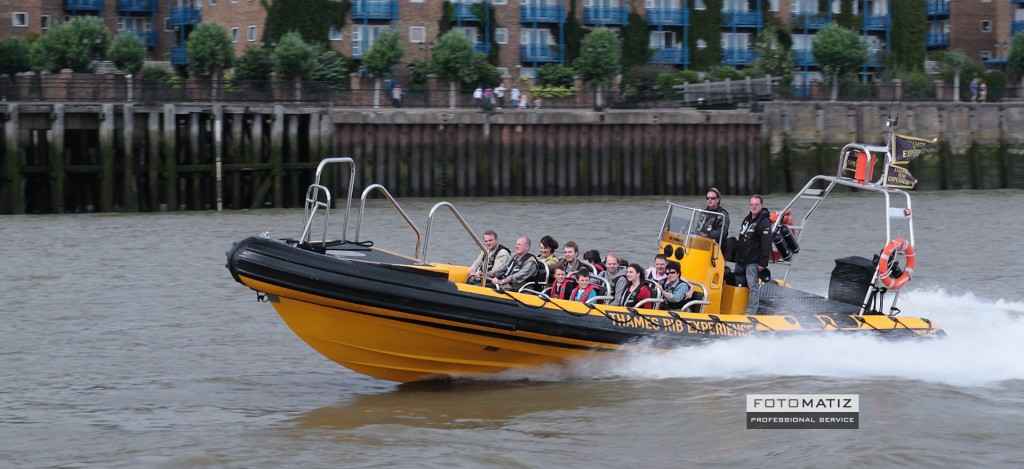 Tourists speedboat on the Thames in London